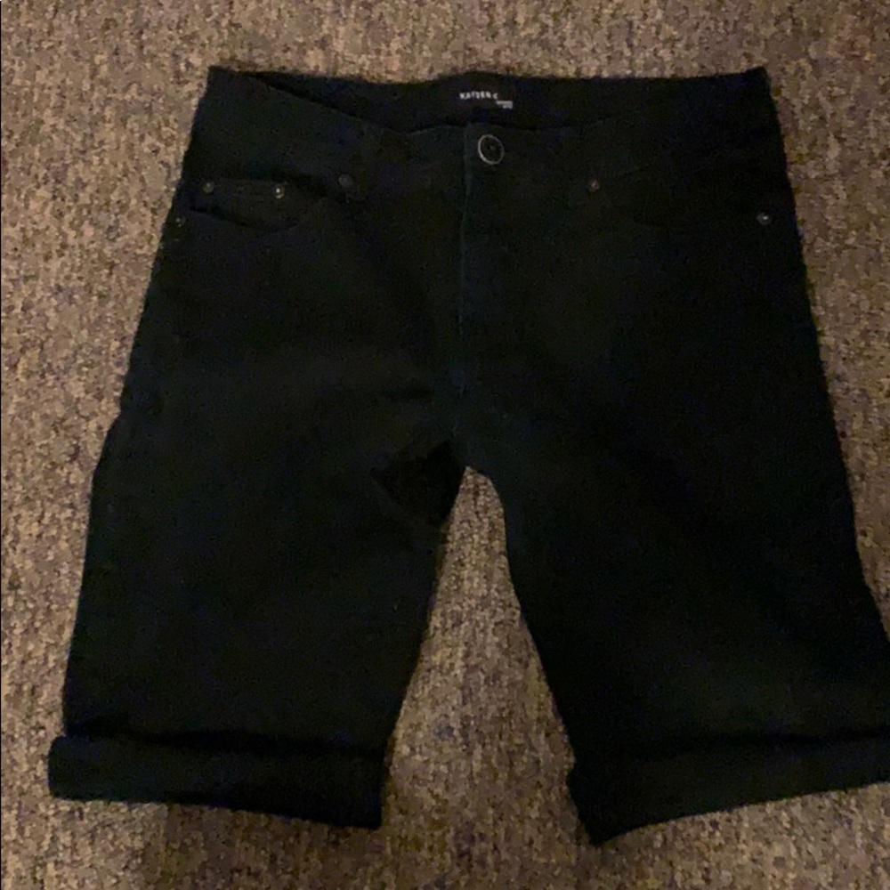 Pair of cut off jeans